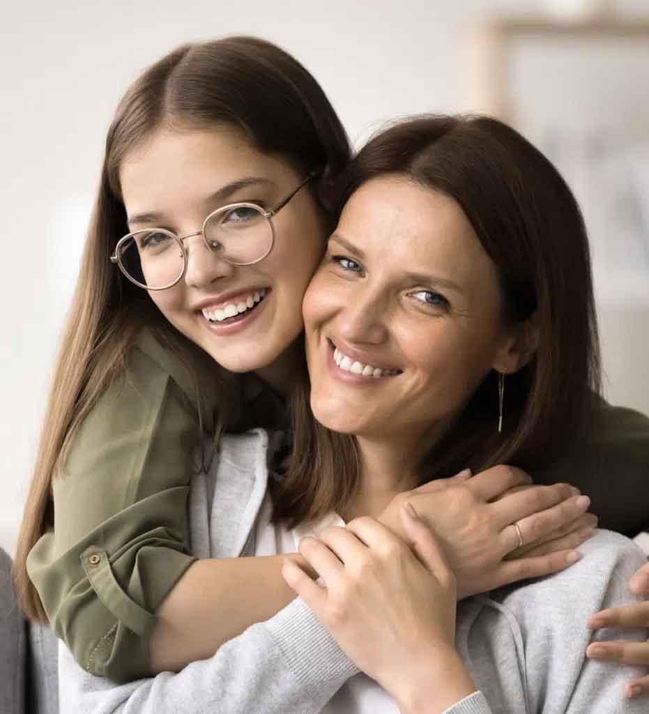 Girl hugs mom